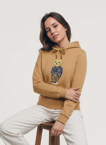 Woman wearing camel embroidered teddy bear hoodie