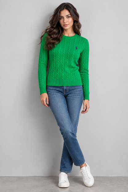 Model wearing green RL Polo cable knit sweater with jeans